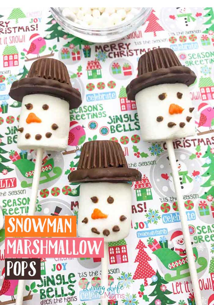 These Snowman Marshmallow pops are perfect for any age of bakers! Tasty winter desserts that are simple to make! Whip up a batch or two with ease and enjoying cooking together as a family! #snowman #marshmallowpops #desserts #wintertreats