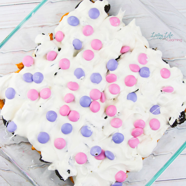 Unicorn Oreo pretzel bark is a fun treat with pink and purple m&m candy, chocolate and pretzels! 