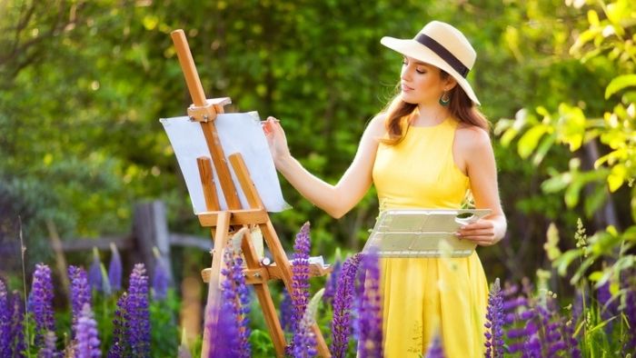 mom painting outside in garden