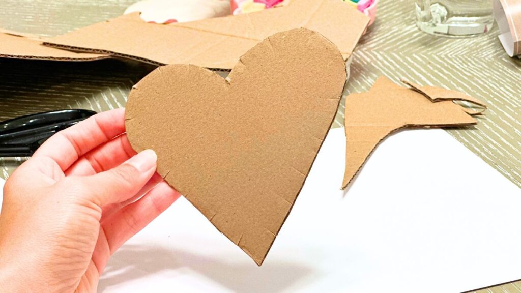 You can lace around the edges of you heart cardboard cutout